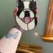 Boston Terrier Puppy Stained Glass Suncatcer being held for size reference.