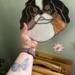 Japanese Chin Stained Glass Suncatcher- being held for size reference.