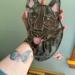 Mudi Stained Glass Suncatcher- black- being held for size reference.