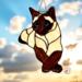 Siamese stained glass suncatcher- Brown and Cream in direct sunlight.