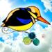 Black-backed Kingfisher suncatcher in direct sunlight- made of black, yellow, orange and dark blue glass. With lamp worked leaves and flower accents.
