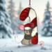 Christmas Mouse stained glass suncatcher. Made with gray, pink, white and red glass. Crystal eyes, nose and hat pom-pom.