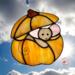 Halloween Mouse Suncatcher made of orange, light brown, light pink and brown glass.