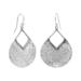 Pair of sterling silver hammered pear dangle earrings displayed on a white background.

