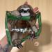 Baby Sloth Stained Glass Suncatcher by Robin C. Hary- shown in Light Brown  being held for size reference.