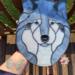 Wolf Suncatcher by Robin C. Hary- shown in Gray and White being held for size reference.