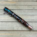 Kingman Turquoise and Copper Penny swirled resin rollerball pen