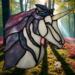 Unicorn by Robin C. Hary- shown in purples and white.