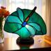 Dragonfly Stained Glass Fan Lamp by Robin C. Hary shown with white wings and green background.