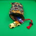 It is 2 sided but can hold a lot like these small cars. Cars are not included with this bag. Just an example. It is 2 sided but can hold a lot like these small cars. Cars are not included with this bag. Just an example.
