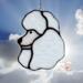 Poodle stained glass ornament shown in white.