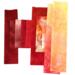 Hand dyed quilting cotton scrap bundle in shades of red, orange and yellow