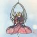 Angel stained glass wind chime- pink dress with blonde hair and white wings.