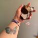 Beagle stained glass ornament being held for size reference. Approximately 4" x 4".