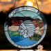 Native Spirit 20 inch round panel, made with a beveled Native American bodice in the center, browns, greens, blues create a desert oasis surrounding him and a beveled outer rim encases the scene.