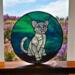 Cat Bevel Panel- 12" diameter, beveled cat with yellow collar, green/blue background.