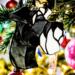 Schnauzer stained glass ornament- Black with natural ears hanging in a Christmas Tree.