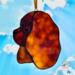 Cavalier King Charles Spaniel stained glass ornament shown in Ruby.