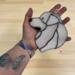 Great Pyrenees stained glass ornament being held for size reference. Approx. 5" x 5".