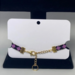 Purple and Black Seed Bead Bracelet showing the chain lobster clasp closure.