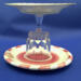 A side view of the lollypop jewelry dish. It's about 6 inches high by 7 inches wide. A side view of the lollypop jewelry dish. It's about 6 inches high by 7 inches wide.