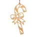 Handmade wooden Christmas tree ornament shaped like a curved candy cane with intricate stripe cutouts, accented by a delicate bow and crafted from natural light colored wood tones.
