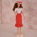 12 inch Fashion Doll in retro style white blouse, red and white polka dot skirt and matching broad brimmed hat.