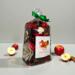Irish Twins Apple Cinnamon Potpourri bag with apples, sliced apples, and cinnamon sticks on a white background.