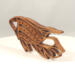 Handcrafted wooden tropical fish ornament made from 1/4-inch thick oak, finished with shellac, designed for holiday decor or year-round display as wall art.