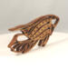 Handcrafted wooden tropical fish ornament made from 1/4-inch thick oak, finished with shellac, designed for holiday decor or year-round display as wall art.