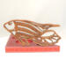 Handcrafted wooden tropical fish ornament made from 1/4-inch thick oak, finished with shellac, designed for holiday decor or year-round display as wall art.