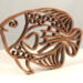 Handcrafted wooden tropical fish ornament made from 1/4-inch thick oak, finished with shellac, designed for holiday decor or year-round display as wall art.