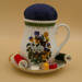 This shows an example of bobbins and thread in the holder. They are not included in the sale. This shows an example of bobbins and thread in the holder. They are not included in the sale.