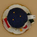 This is a view looking from the top down. It provides a good view of the trim on the saucer as well as the leaves. This is a view looking from the top down. It provides a good view of the trim on the saucer as well as the leaves.