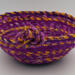 This is looking directly at the basket with the knot in front. The base is 6 inches. At 9.5 inches wide, the depth of 4 inches is ample. This is looking directly at the basket with the knot in front. The base is 6 inches. At 9.5 inches wide, the depth of 4 inches is ample.