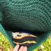 A close up of the inside of the Nutcracker pocket. All yarn ends have been sewn in so there is nothing for fingers to catch on. A close up of the inside of the Nutcracker pocket. All yarn ends have been sewn in so there is nothing for fingers to catch on.