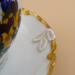 This is a closeup of the lace leaves that were used to enhance the blemish of the saucer. This is a closeup of the lace leaves that were used to enhance the blemish of the saucer.