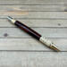 Exotic dark Mexican Cocobolo wood and brass click pen Exotic dark Mexican Cocobolo wood and brass click pen