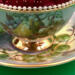 This shows details of the hand painting on the cup and saucer. This shows details of the hand painting on the cup and saucer.