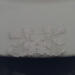 This is the lace covering the blemish on the underside of the plate. This is the lace covering the blemish on the underside of the plate.