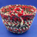This is a view looking at the side with the loop detail. The bowl is 7 inches wide by 4.5 inches deep and a base of about 4.5 inches. This is a view looking at the side with the loop detail. The bowl is 7 inches wide by 4.5 inches deep and a base of about 4.5 inches.