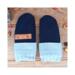 Handmade navy blue wool baby mittens with ribbed light blue cuffs, made from soft fleece; cozy thumbless winter gear for infants & toddlers.
