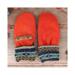 Handmade orange fleece baby mittens with patterned cuffs, made from soft fleece; cozy thumbless winter mittens for infants & toddlers.