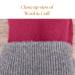 Close-up view of burgundy red wool baby mitten with gray knit cuff; shows soft texture & cozy handmade detail. Mittens for baby & toddler.