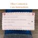 Product label showing fiber content and care instructions for handmade baby mittens — machine washable for easy care.
