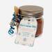 Winter Hot Cocoa Jar with blue ribbon, wooden spoon, and snowflake tag displayed on white background.