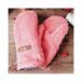 A cozy pair of children's mittens for ages 8 to 10. Handmade mittens crafted from fluffy coral pink fleece; warm, cozy and winter ready.