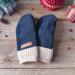 A cozy pair of teen, small woman’s handmade mittens crafted from fluffy blue fleece with tan beige ribbed cuffs; handmade and winter ready.
