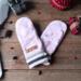A cozy pair of teen, small woman’s handmade mittens crafted from soft pink argyle pattern fleece with ribbed cuffs; handmade & winter ready.