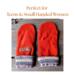 A pair of handmade teen, small women’s mittens made from soft rust orange fleece with patterned cuffs.